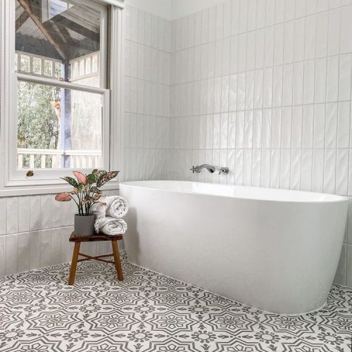 Rever Tiles | AZTEC-003.2 | Encaustic Tile Bathroom Design. Add flare to an otherwise neutral room and create a beautiful feature floor with our Aztec-2 encaustic tile in contrasting silver on white.
