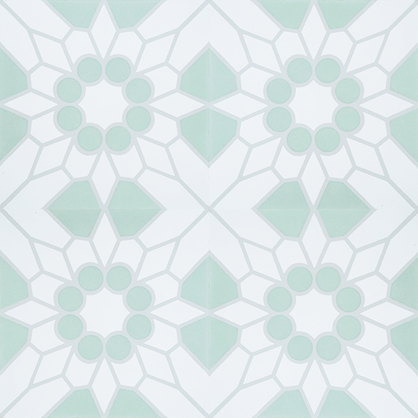 The playful design of our Jerez encaustic tile and soft mint green creates the perfect foundation for a refreshing bathroom. Four tile view - Rever Tiles.